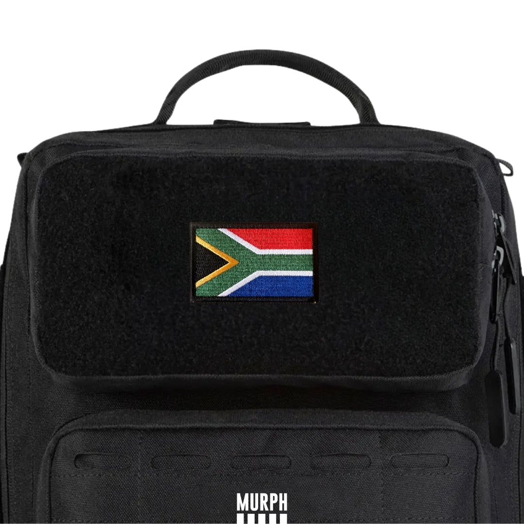 Patch velcro drapeau Afrique du Sud fixé sur le panneau velcro d'un sac à dos tactique Murph noir