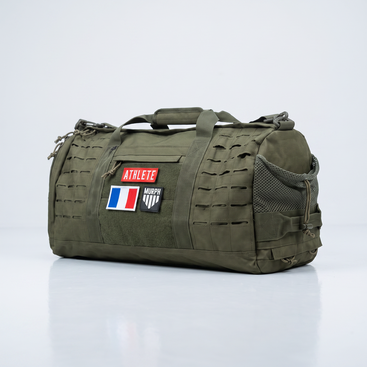 Poches laterales du sac polochon tactique Murph kaki, vue trois quarts